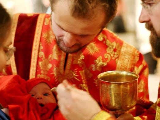 Sulla comunione ai bambini che piangono